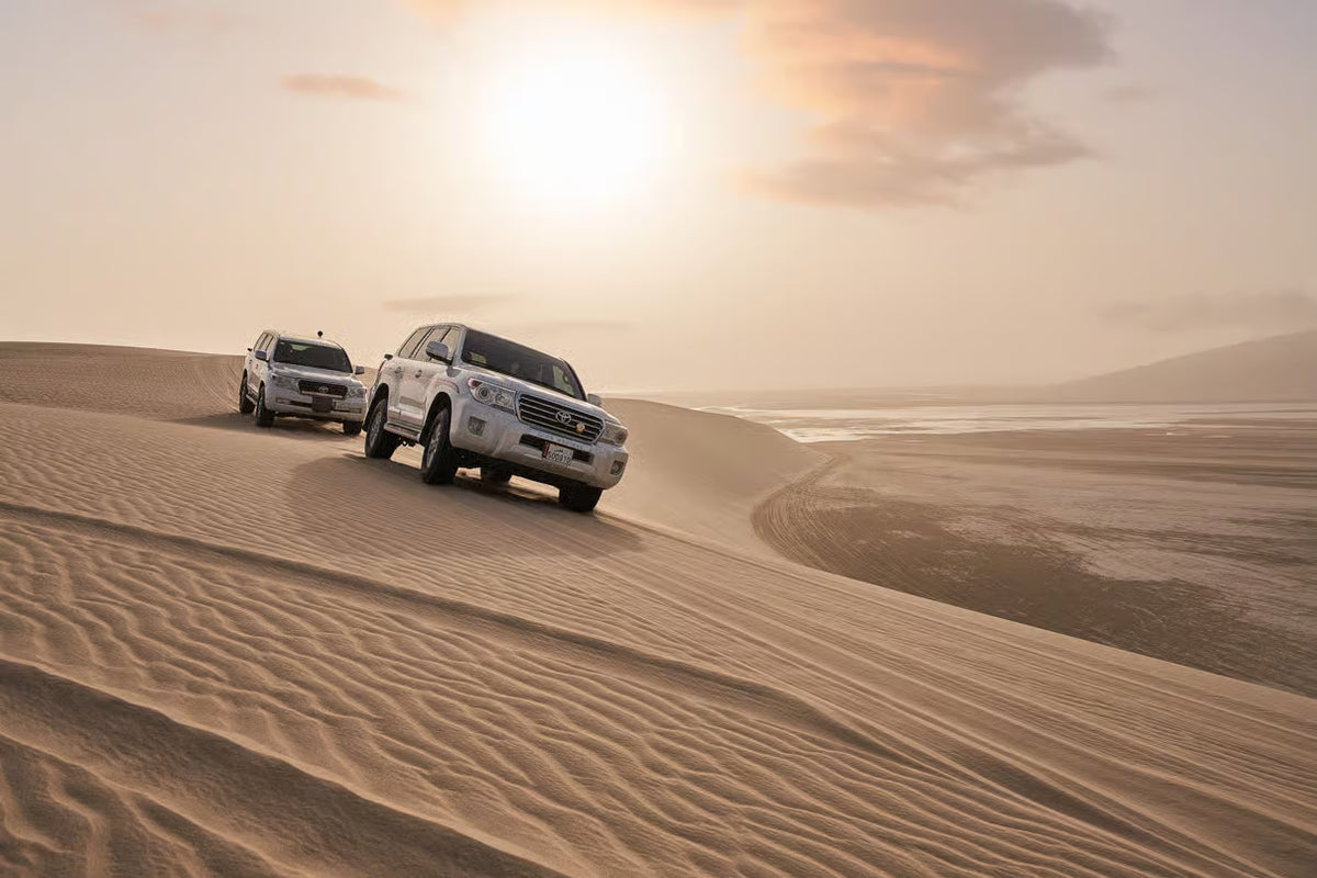 Doha: Desert Safari, Sandboarding and Mina District Tour