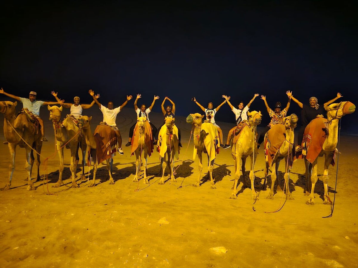 Doha : safari nocturne privé dans le désert avec balade à dos de chameau et observation des étoiles
