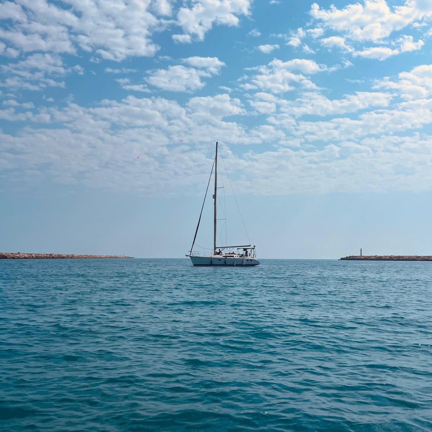 Porto Marina: viaje privado en velero Andiamo en la costa norte