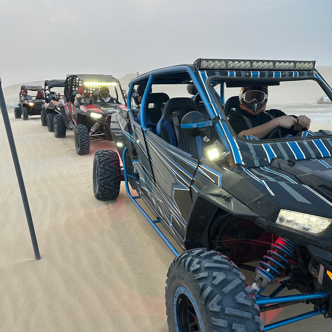 Doha: Desert Safari, Quad Bike Ride, Camel Ride, Sandboarding, and Inland Sea Visit