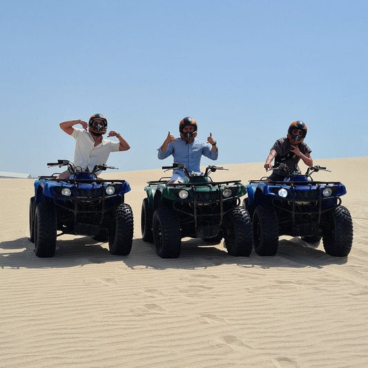 Doha: Desert Safari, Quad Bike Ride, Camel Ride, Sandboarding, and Inland Sea Visit