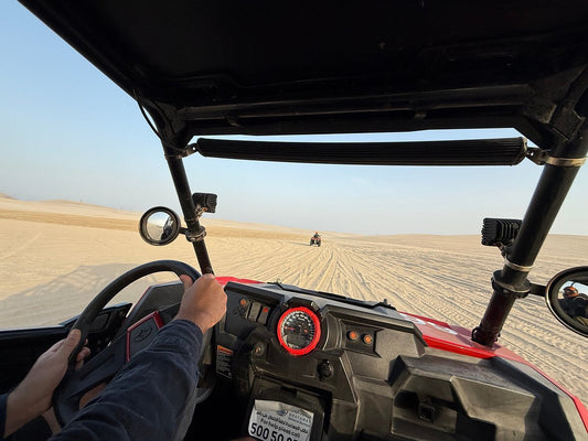 Doha: Desert Safari, Quad Bike Ride, Camel Ride, Sandboarding, and Inland Sea Visit