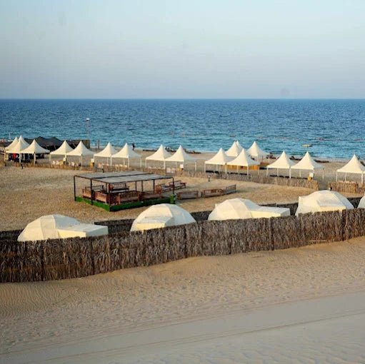 Doha: Overnight Desert Safari at Khor Al Adaid with Camel Ride and BBQ Dinner