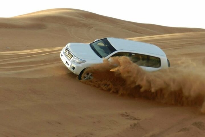Doha: Overnight Desert Safari at Khor Al Adaid with Camel Ride and BBQ Dinner