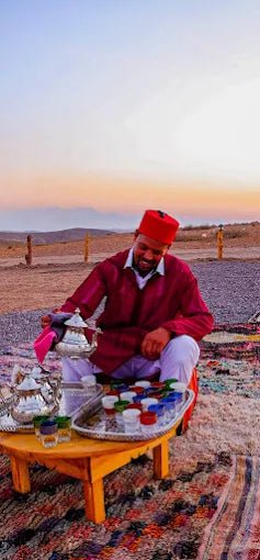 From Marrakech: Agafay Desert Camel Ride, Swimming, and Lunch