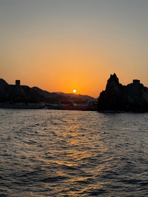 Muscat: Sunset Boat Cruise with Coastal and Mountain Views