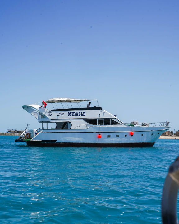 Porto Marina: Miracle Private Yacht Trip with Swimming and Optional Lunch in North Coast