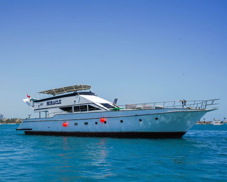 Porto Marina: Miracle Private Yacht Trip with Swimming and Optional Lunch in North Coast