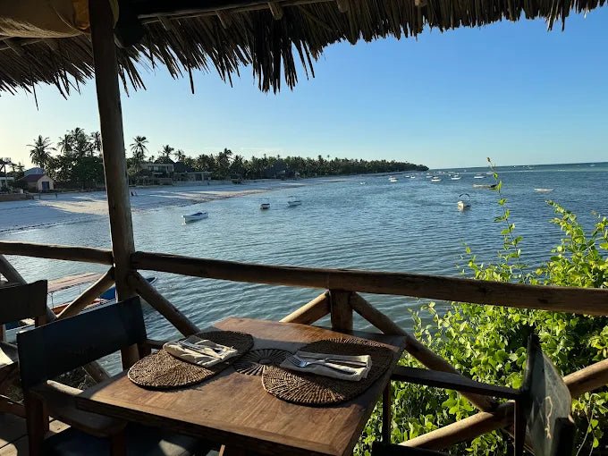 Zanzibar: Full - Day Mnemba Atoll, Dolphin Swim, Jozani Forest, and The Rock Restaurant Tour