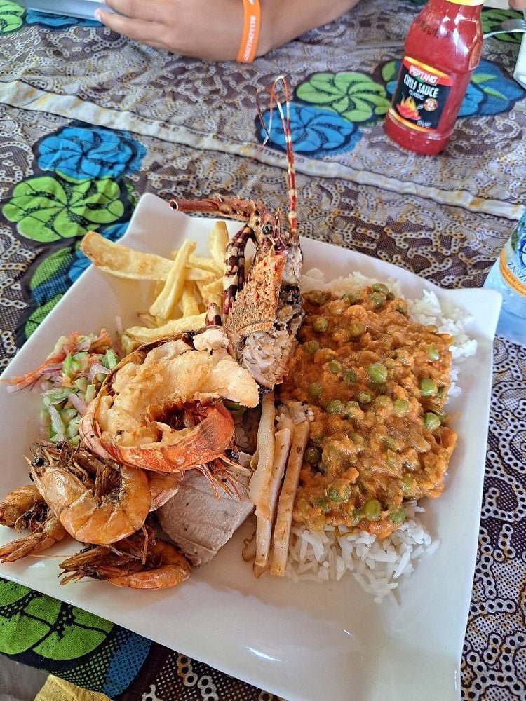 Zanzibar: Mnemba Island Dolphin Swim, Snorkeling, and Sandbank Picnic Trip