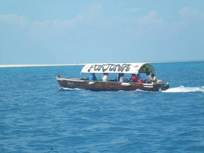 Zanzibar: Mnemba Island Private Snorkeling Tour with Sandbank Stop