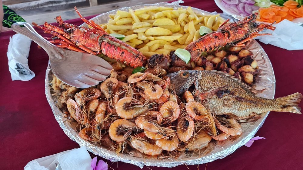 Zanzibar: Safari Blue and Kwale Island Snorkeling Day Trip with Seafood Lunch