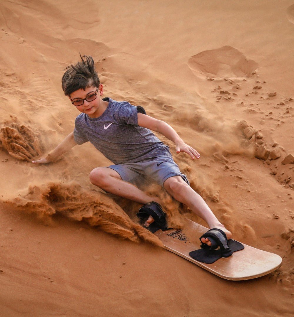 Dubai: Rote Dünen mit dem Quad, Kamelritt, Sandboarding und BBQ im Al Khayma Camp