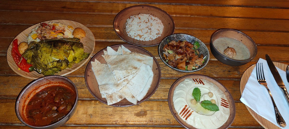 Dubai: Rote Dünen mit dem Quad, Kamelritt, Sandboarding und BBQ im Al Khayma Camp