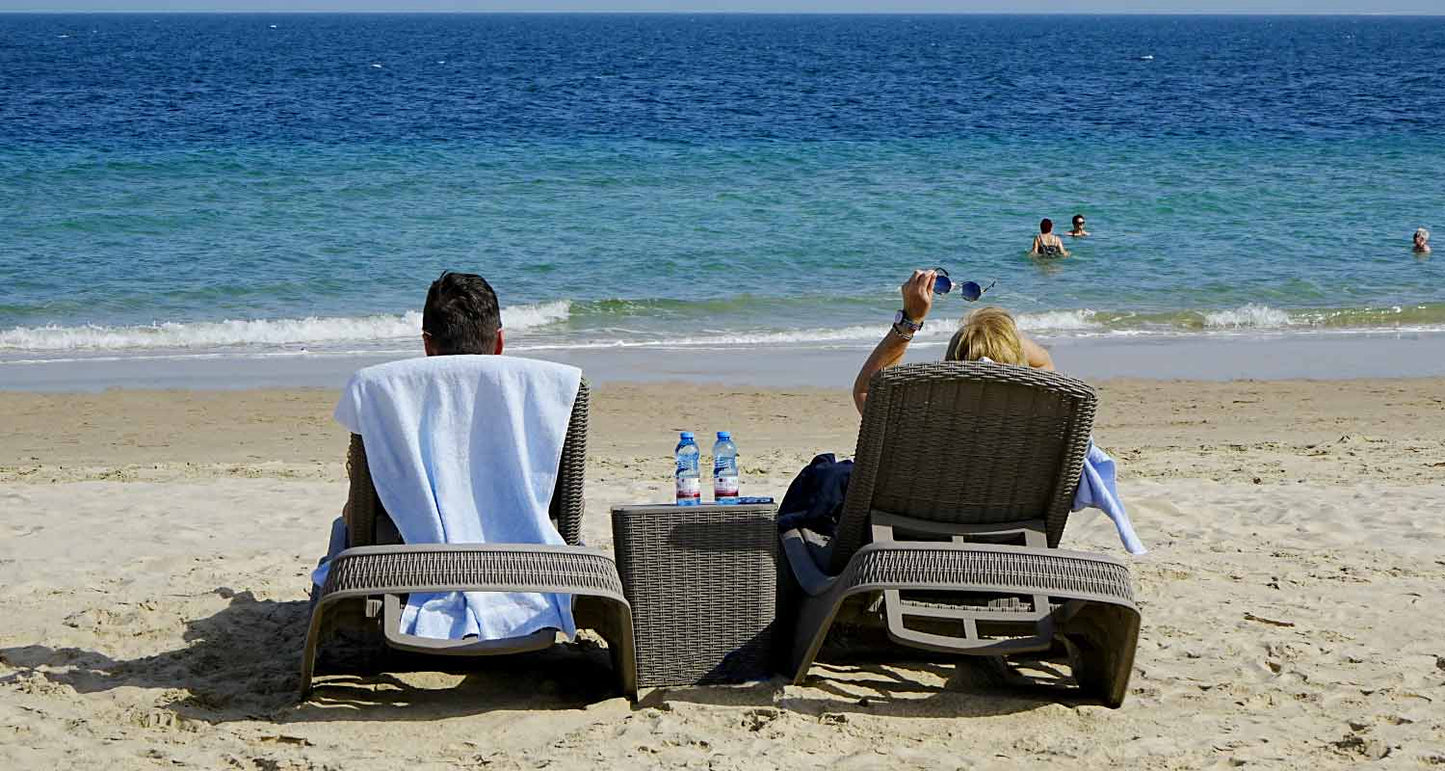 Doha : utilisation d'une journée dans un camp dans le désert, safari en option, sandboard et balade à dos de chameau
