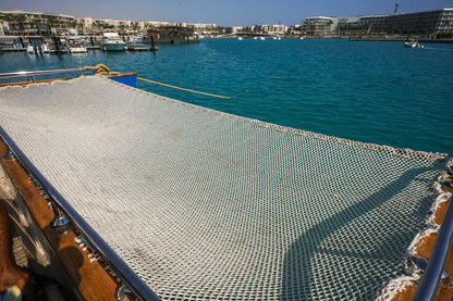 Marassi: Gita in Yacht Privato con Nuoto e Pranzo Opzionale sulla Costa Nord