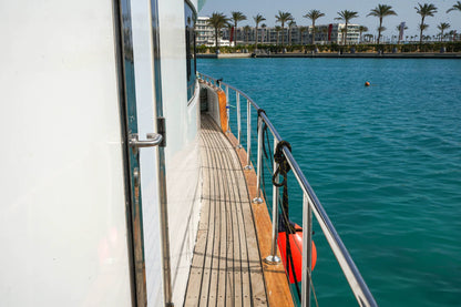 Marassi: Gita in Yacht Privato con Nuoto e Pranzo Opzionale sulla Costa Nord