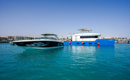 Marassi: Gita in Yacht Privato con Nuoto e Pranzo Opzionale sulla Costa Nord