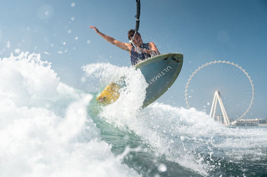 Dubai: Wakesurfing and Wakeboarding with the Views of Dubai Marina, JBR and Dubai Eye.