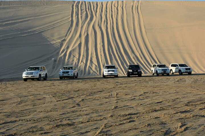 Doha: 4x4 Full-Day Private Desert Safari, Camel Ride, Quad Bike and BBQ Dinner Trip