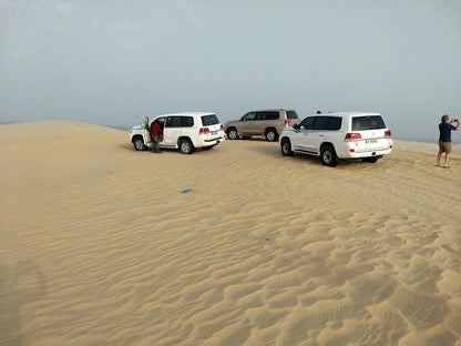 Doha: 4x4 Half-Day Desert Safari, Camel Ride, Sandboarding and Inland Sea Tour