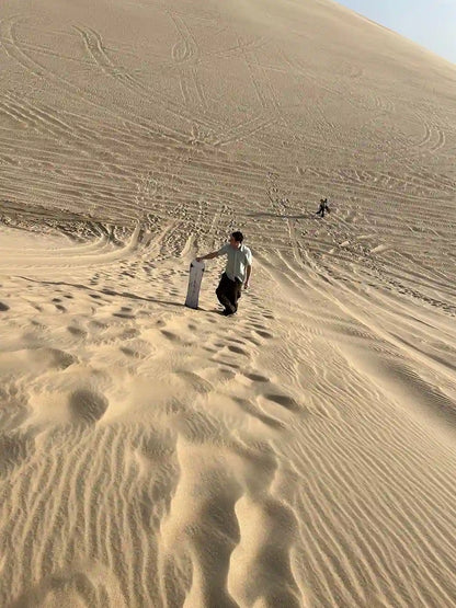 Doha: Desert Safari, Sandboarding and Mina District Tour