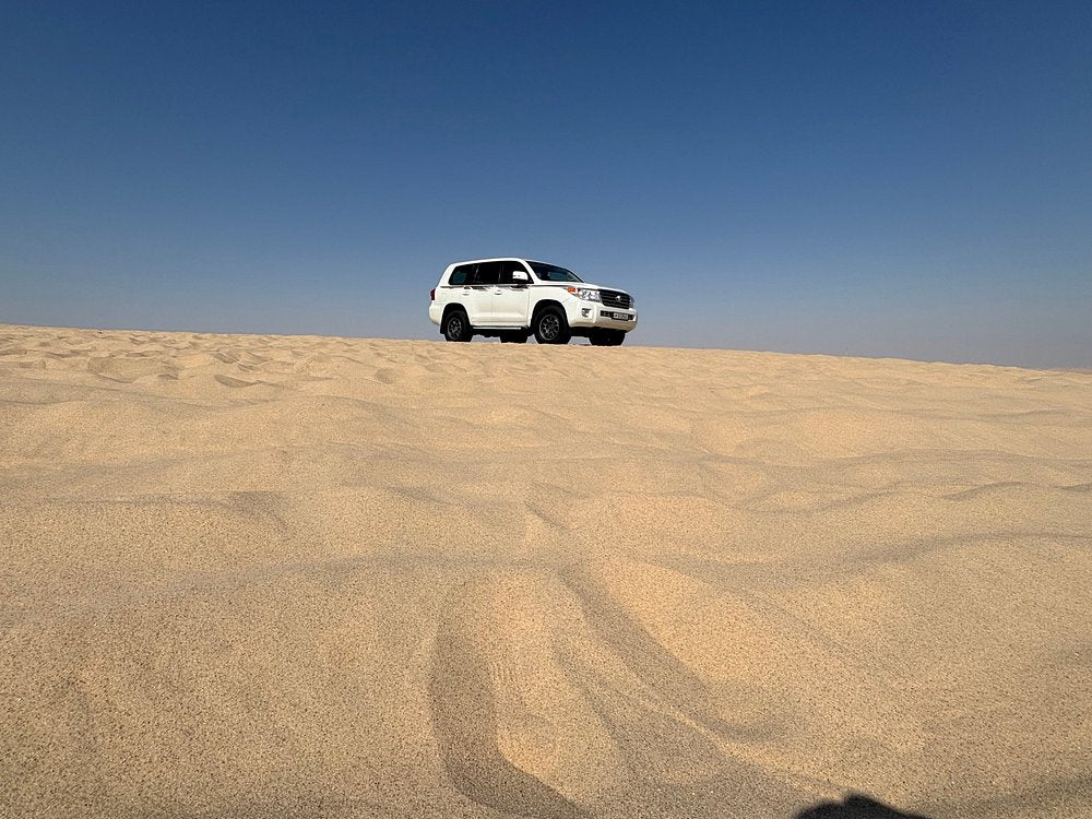 Doha: Desert Safari, Sandboarding and Mina District Tour