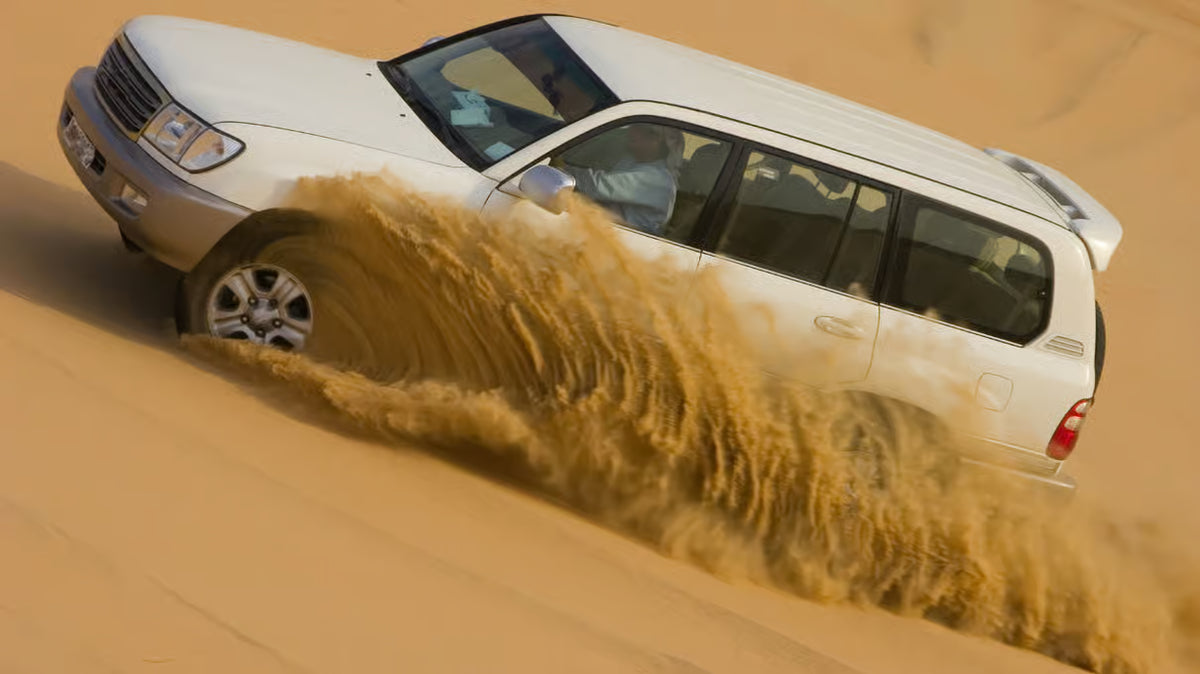 Doha: Desert Safari, Sandboarding and Mina District Tour