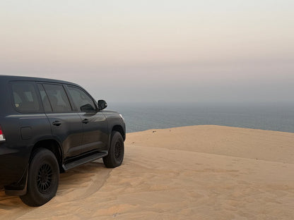 Doha: Desert Safari, Sandboarding and Mina District Tour