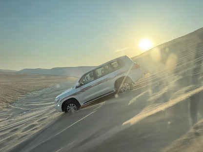 Doha: Inland Sea Desert Safari with Dune Bashing, Camel Ride and Sandboarding