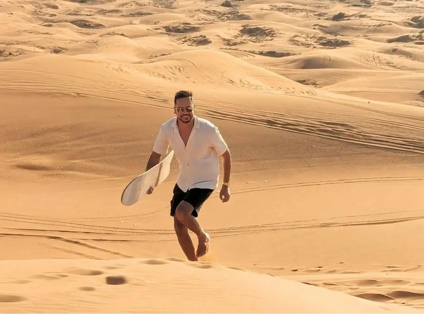 Doha: Inland Sea Desert Safari with Dune Bashing, Camel Ride and Sandboarding