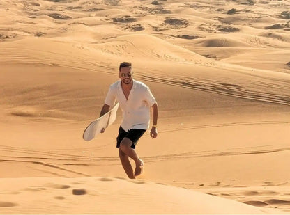 Doha: Inland Sea Desert Safari with Dune Bashing, Camel Ride and Sandboarding