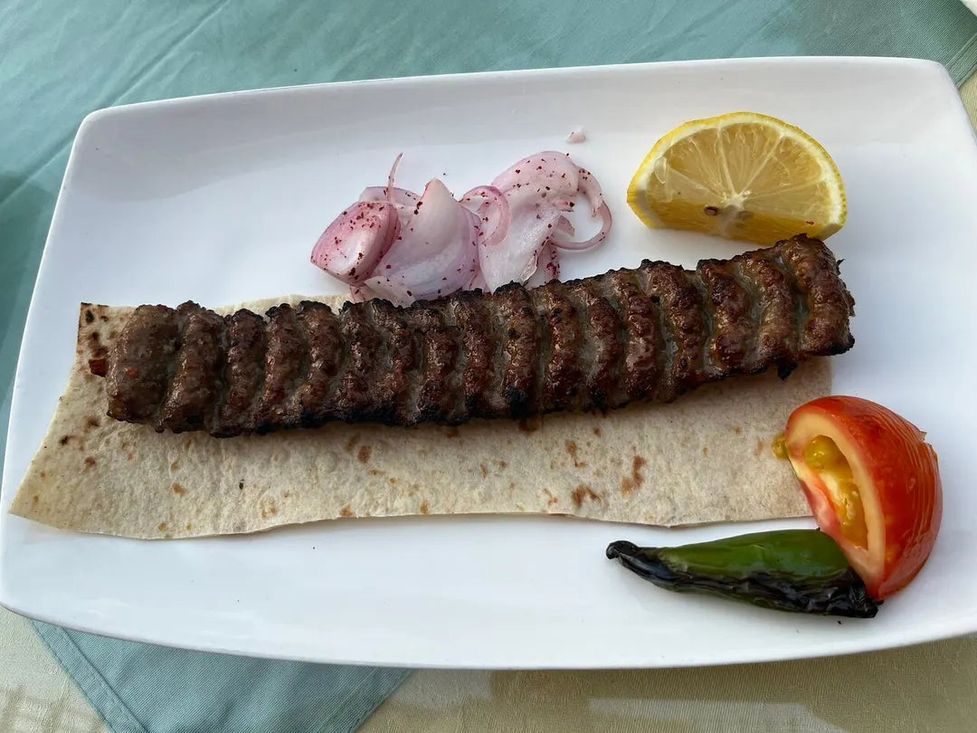 दोहा: पर्ल आइलैंड फूड और बोट टूर 7 चखने के साथ