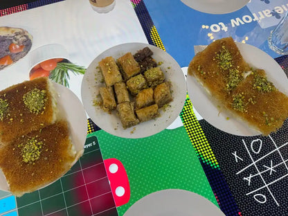 दोहा: पर्ल आइलैंड फूड और बोट टूर 7 चखने के साथ