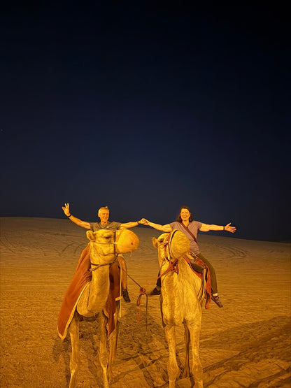 Doha : safari nocturne privé dans le désert avec balade à dos de chameau et observation des étoiles