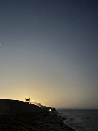 Doha : safari nocturne privé dans le désert avec balade à dos de chameau et observation des étoiles