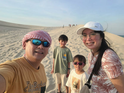 Doha: Geführte Tour zu den singenden Sanddünen und dem Misfir-Sinkloch