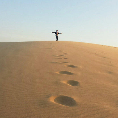 Doha: Geführte Tour zu den singenden Sanddünen und dem Misfir-Sinkloch