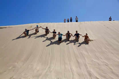 From Agadir o Taghazout: tour de sandboard en las dunas de Timlalin con paseo en camello opcional
