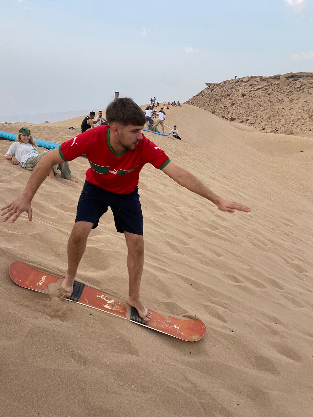 From Agadir o Taghazout: tour de sandboard en las dunas de Timlalin con paseo en camello opcional