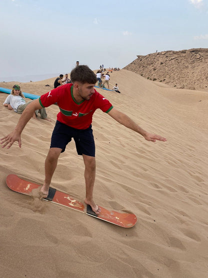 From Agadir o Taghazout: tour de sandboard en las dunas de Timlalin con paseo en camello opcional