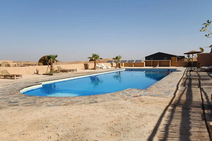 From Marrakech: giro in quad nel deserto di Agafay, giro in cammello e gita in piscina con pranzo