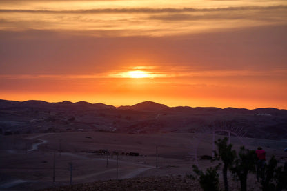 From Marrakech: Agafay Desert Sunset Camel Ride, Dinner and Fire Show