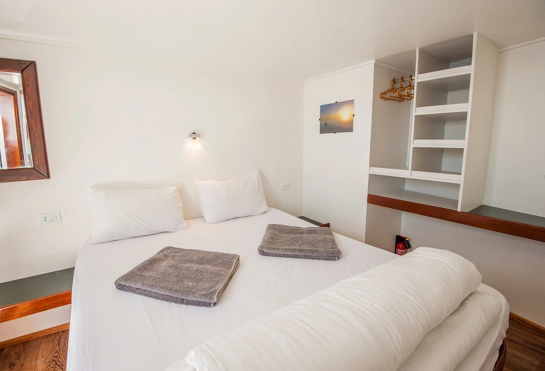 Tilbring den første natten om bord (hvis overnattingsalternativet er valgt)