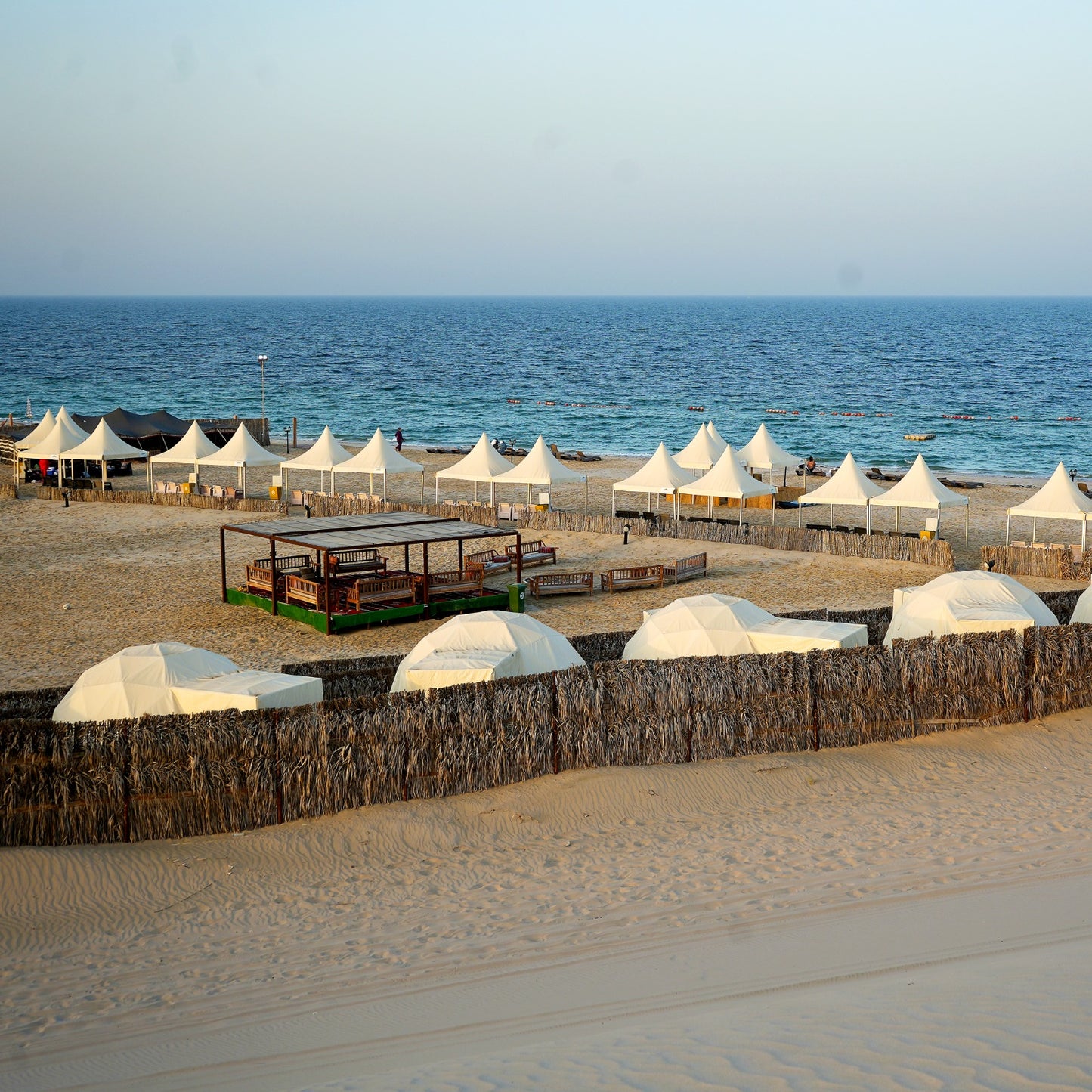 Doha: Desert Camp Day Use, Optional Safari, Sandboarding, and Camel Ride Tour