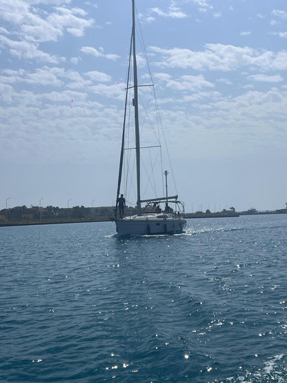 Porto Marina: viaje privado en velero Andiamo en la costa norte
