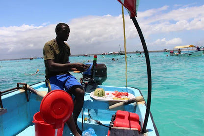 Zanzibar: Mnemba Island Dolphin Watching and Snorkelling Tour