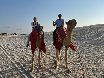 Doha : Safari dans le désert avec sandboard, visite de la mer intérieure et balade à dos de chameau en option