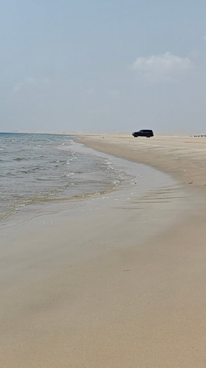 Doha : utilisation d'une journée dans un camp dans le désert, safari en option, sandboard et balade à dos de chameau
