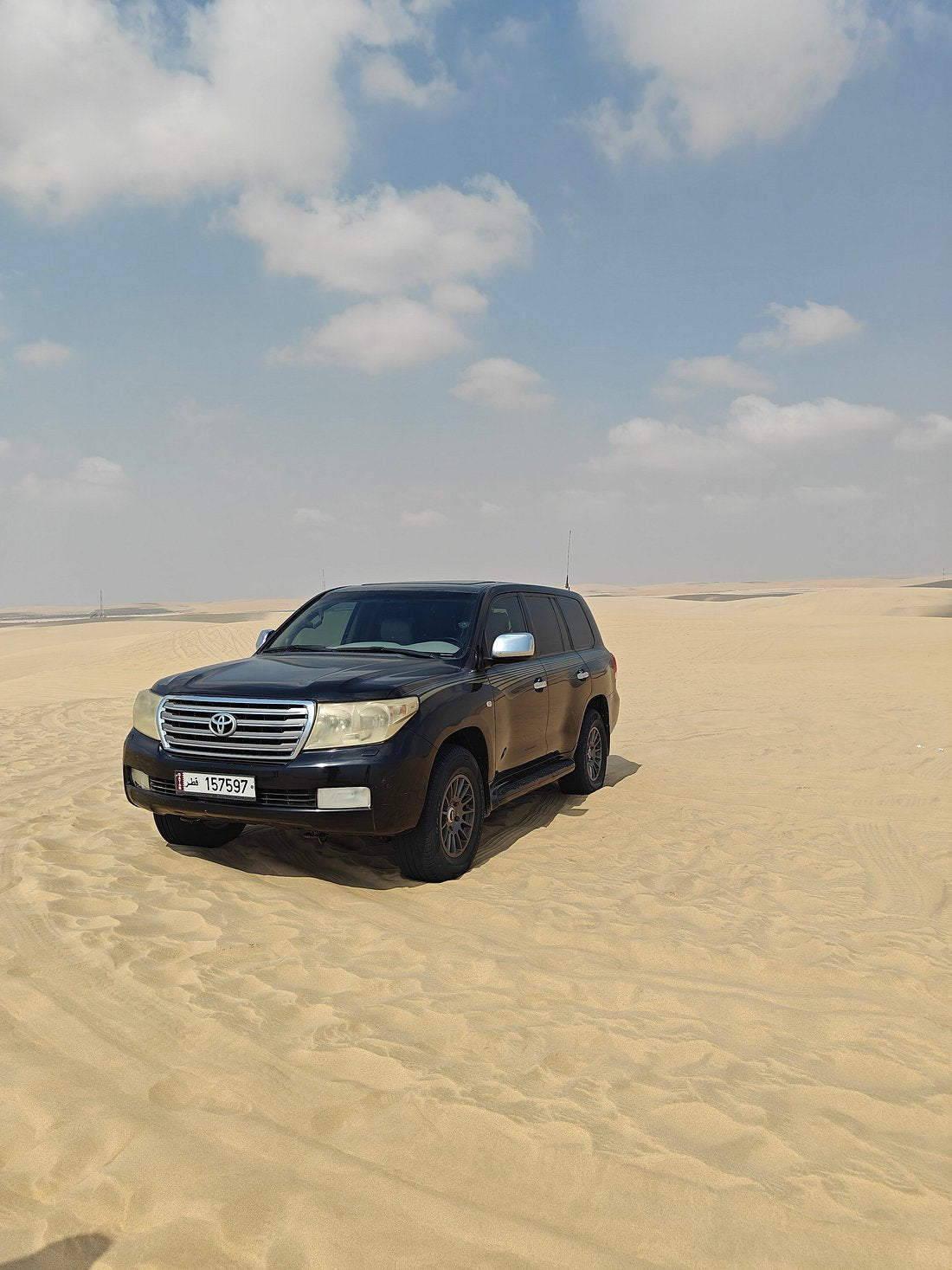 Doha : utilisation d'une journée dans un camp dans le désert, safari en option, sandboard et balade à dos de chameau